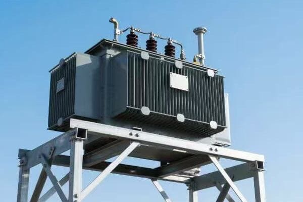 Utility technician examining a pad mounted transformer diagram