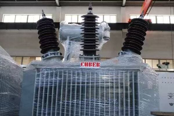 Cutaway diagram of an oil immersed power transformer showing key components