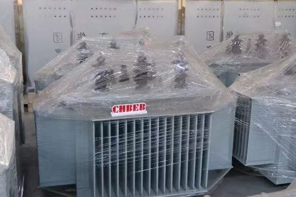Image of an oil-immersed transformer in an outdoor substation