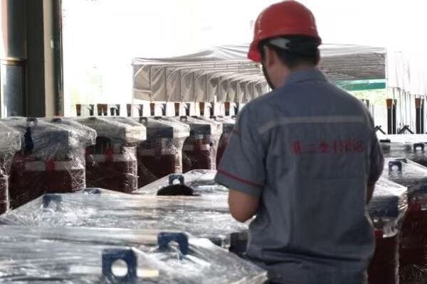 Engineers working on advanced transformer designs in a high-tech R&D facility