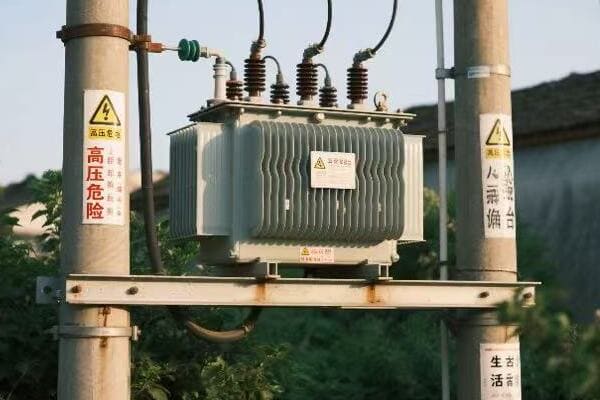 Maintenance technician working on a pad mounted transformer