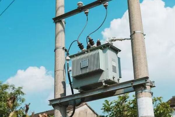 Urban streetscape with pole and pad-mounted transformers